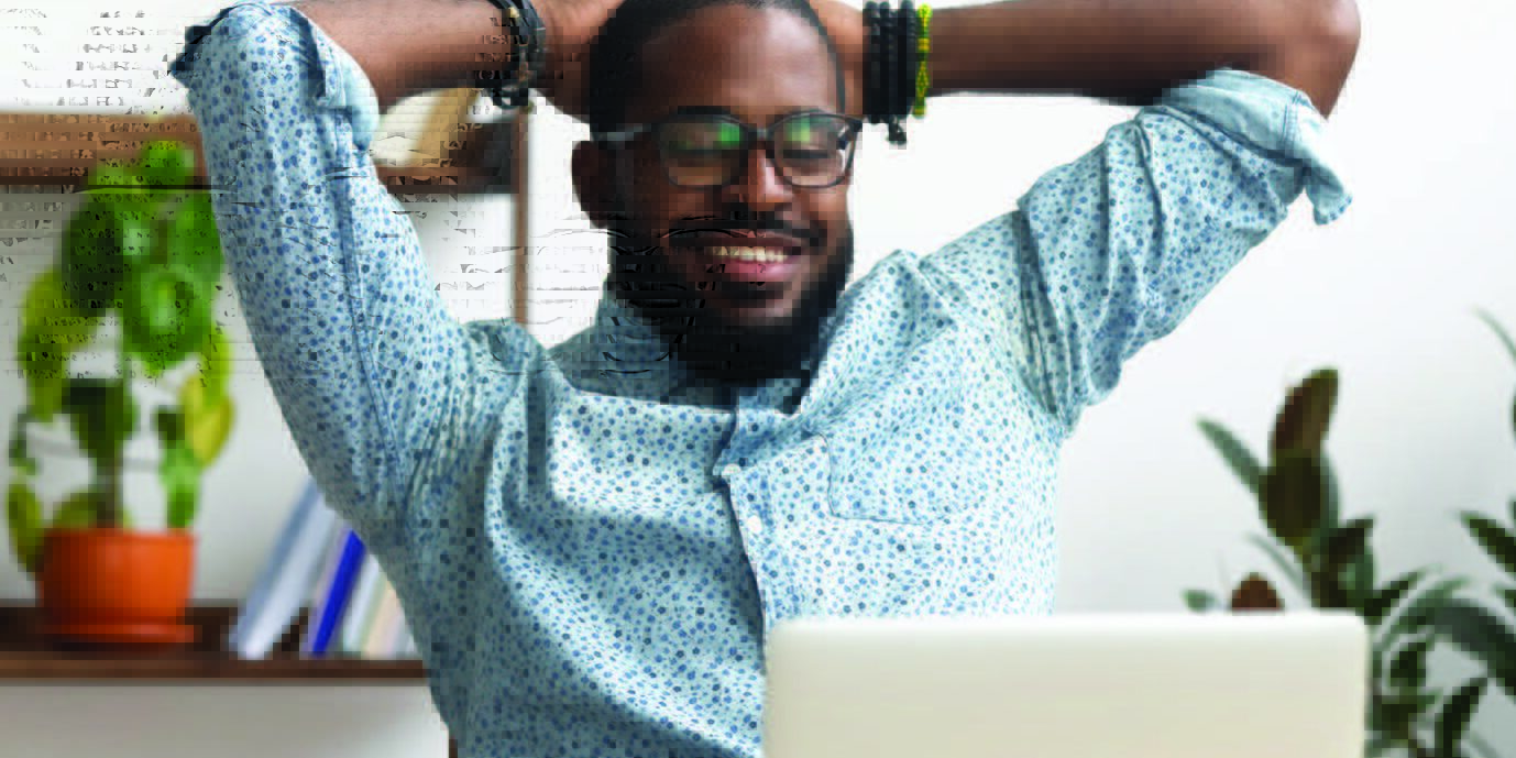 Man sitting in front of laptop